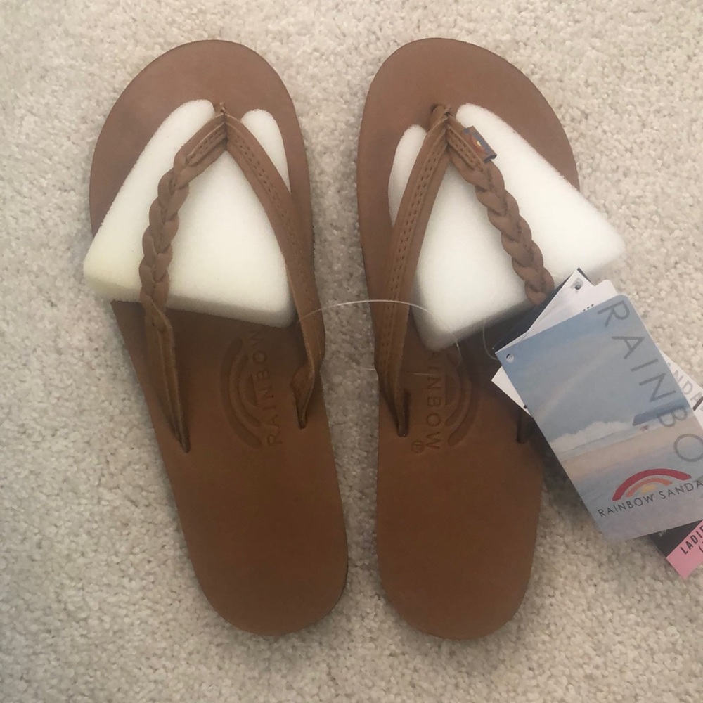 Brand new never worn flirty braidy Rainbow tan flip flop sandals size 7.5-8.5